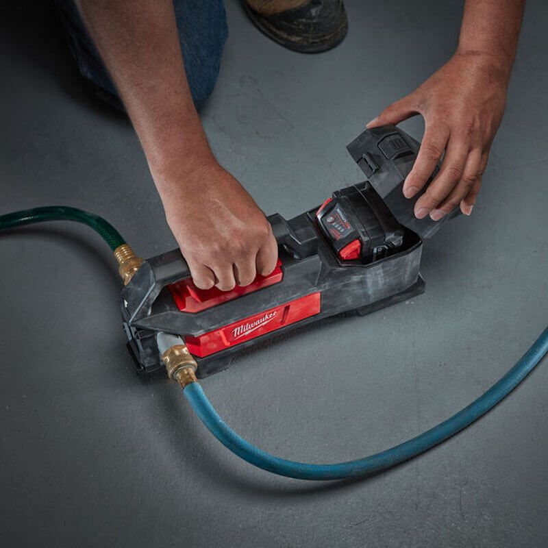 Milwaukee M18 Compact Transfer Pump Close Up Action Shot Milwaukee M18 Compact Transfer Pump Close Up Action Shot